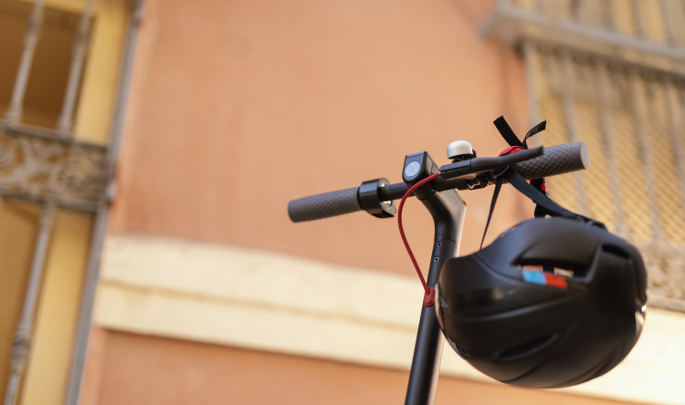 electrical-scooter-with-helmet-city.jpg